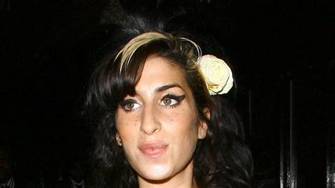 amy winehouse nip slip|Amy Winehouse strips for a breast cancer awareness image